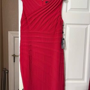 Adrianna Papell red cocktail dress featuring a pleated design.